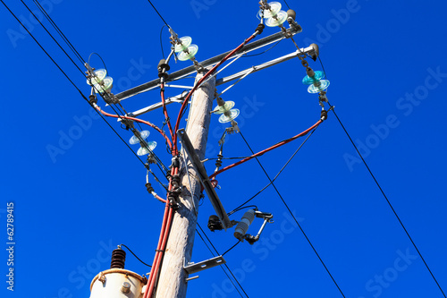 Photo: a post with electrical wires a post with electrical wires