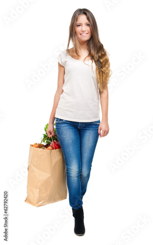 Photo: Woman holding a shopping bag Woman holding a shopping bag
