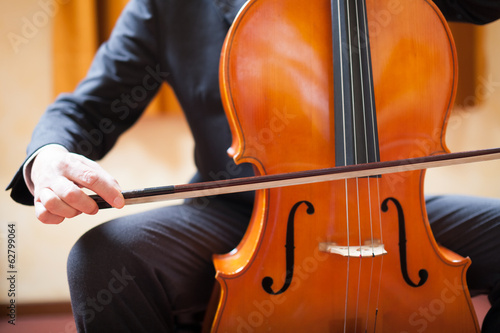 Photo: Man playing a cello Man playing a cello