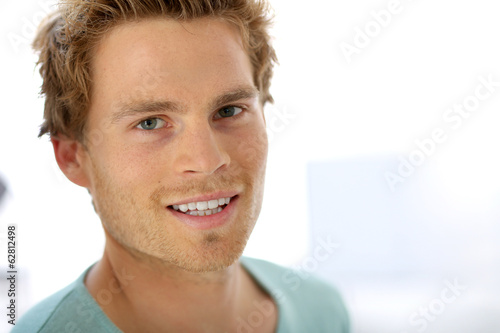 Photo: Portrait of handsome smiling man Portrait of handsome smiling man