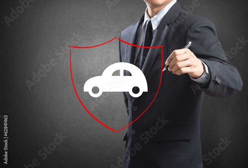 Photo: Shield protecting auto car, insurance concept Shield protecting auto car, insurance concept