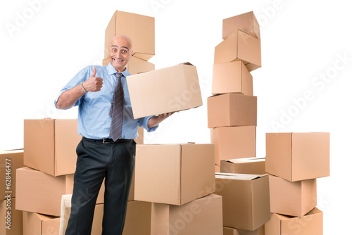 Photo: Businessman with boxes Businessman with boxes