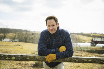Photo: An Organic Farm in Winter in Cold Spring, New York State. A man working outdoors on the farm. An Organic Farm in Winter in Cold Spring, New York State. A man working outdoors on the farm.