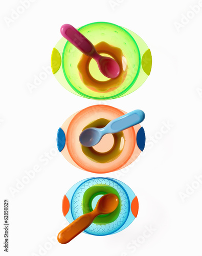 Photo: Colourful plastic spoons for use by infants and babies. Coloured plastic bowls. Colourful plastic spoons for use by infants and babies. Coloured plastic bowls.