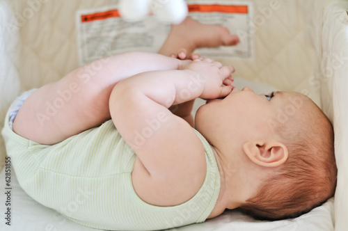 Photo: baby in crib baby in crib