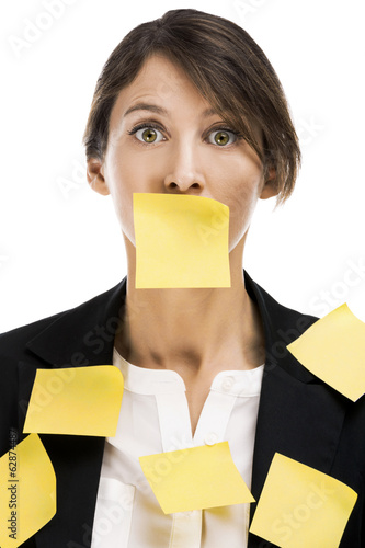 Photo: Woman with yellow paper notes Woman with yellow paper notes