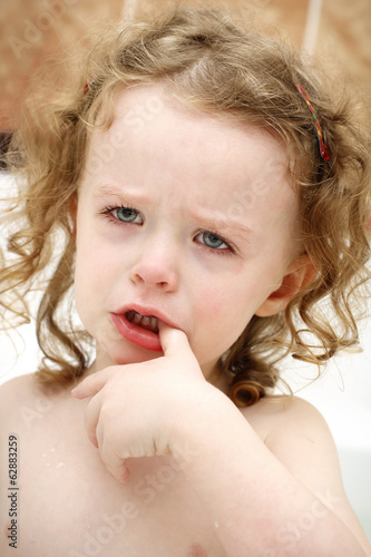 Photo: Little nasty child crying in the bath Little nasty child crying in the bath