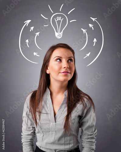 Photo: Pretty lady thinking with arrows and light bulb overhead Pretty lady thinking with arrows and light bulb overhead