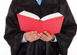 Judge Holding Statute Book Judge Holding Statute Book