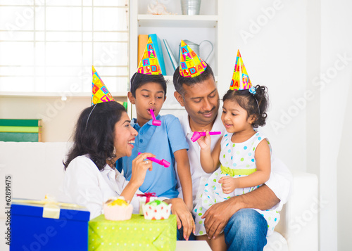 Photo: indian family birthday celebration with son and daughter indian family birthday celebration with son and daughter
