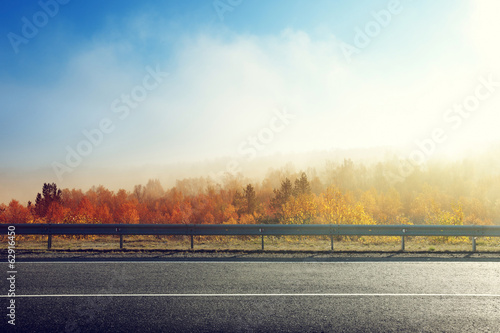 Photo: autumn road in sunset time autumn road in sunset time