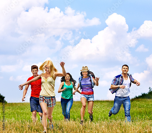 Photo: Group people summer outdoor. Group people summer outdoor.