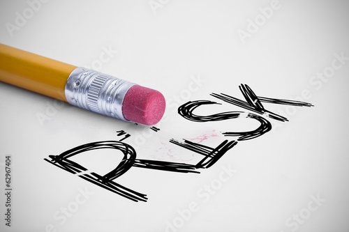 Photo: Risk against pencil with an eraser Risk against pencil with an eraser