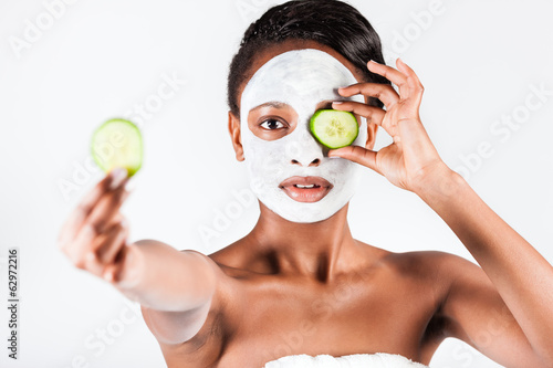 Photo: Beautiful African woman in Studio with facial mask Beautiful African woman in Studio with facial mask