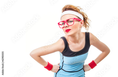 Photo: Serious fitness woman, isolated on white Serious fitness woman, isolated on white