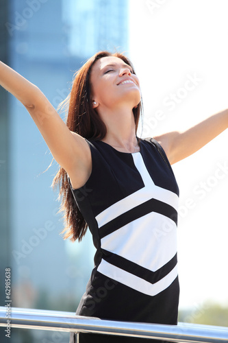 Photo: Successful businesswoman. Concept of leadership and success Successful businesswoman. Concept of leadership and success