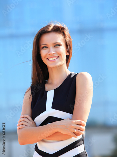 Photo: Portrait of a successful business woman smiling Portrait of a successful business woman smiling