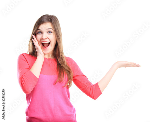 Photo: happy excited beautiful woman looking at your product with joy happy excited beautiful woman looking at your product with joy