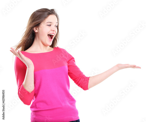 Photo: happy excited beautiful woman looking at your product with joy happy excited beautiful woman looking at your product with joy