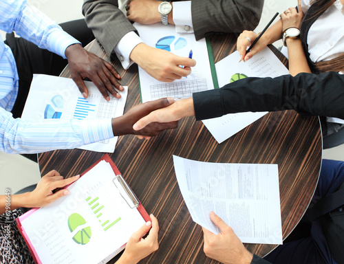 Photo: Business people shaking hands Business people shaking hands