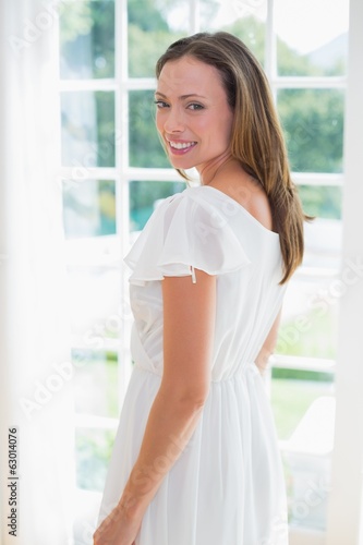 Photo: Portrait of a beautiful young woman at home Portrait of a beautiful young woman at home