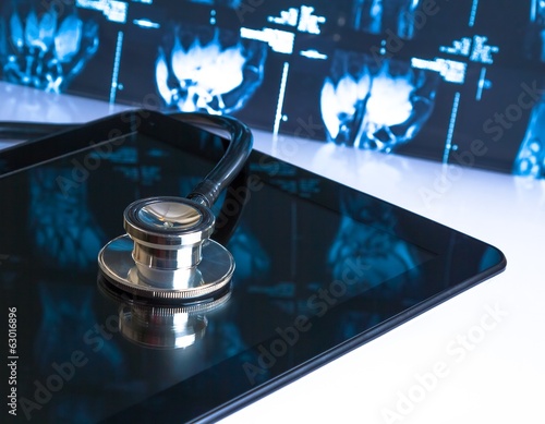 Photo: stethoscope on digital tablet in laboratory on x-ray image stethoscope on digital tablet in laboratory on x-ray image