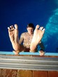 young boy in a swimming pool on a beautiful summer sunny day young boy in a swimming pool on a beautiful summer sunny day
