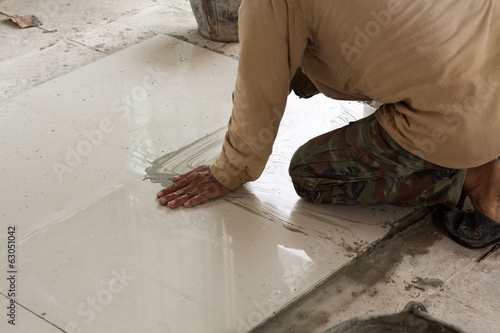 Photo: He will tiled and press tile He will tiled and press tile