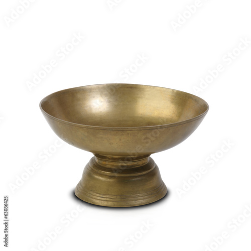Photo: Ancient brass bowl for asian special ceremony isolated Ancient brass bowl for asian special ceremony isolated