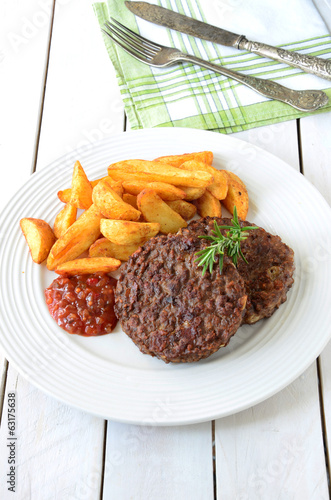 Photo: Veggie Burger with potato wedges Veggie Burger with potato wedges