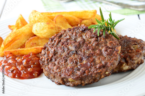 Photo: Veggie Burger with potato wedges Veggie Burger with potato wedges