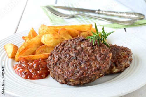 Photo: Veggie Burger with potato wedges Veggie Burger with potato wedges