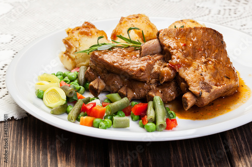 Photo: Pork spareribs served with mashed potatoes Pork spareribs served with mashed potatoes