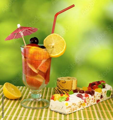 Photo: cocktail on green background cocktail on green background