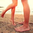 Kissing lovers - couple on beach love concept Kissing lovers - couple on beach love concept