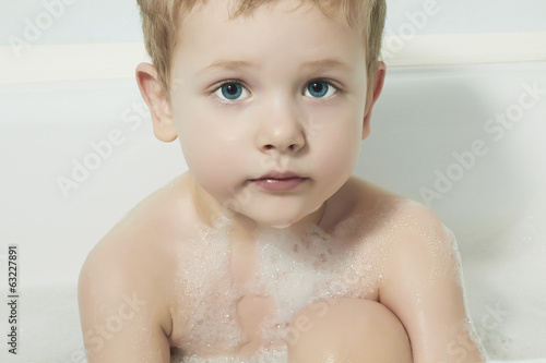 Photo: Little Boy in the Bath.Funny Child in Foam Little Boy in the Bath.Funny Child in Foam
