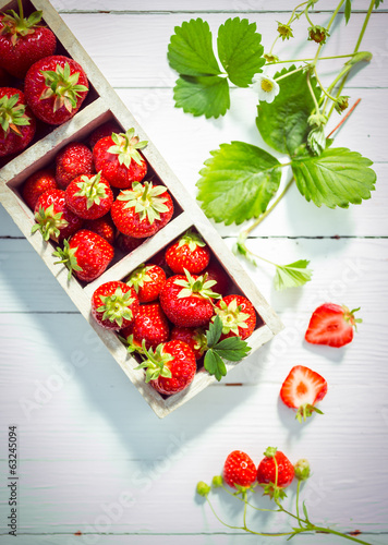  Display of delicious ripe red strawberries