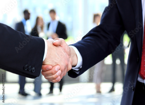 Photo: Closeup of a business handshake Closeup of a business handshake
