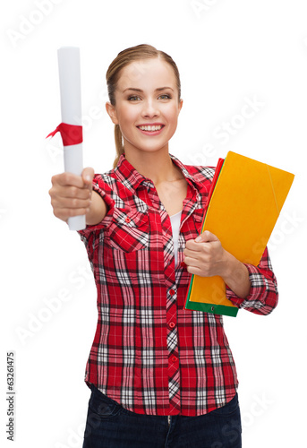 Photo: smiling woman with diploma and folders smiling woman with diploma and folders