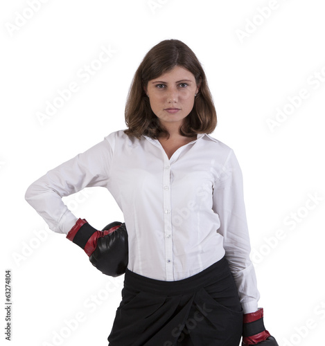 Photo: Portrait of a young woman wearing boxing gloves Portrait of a young woman wearing boxing gloves