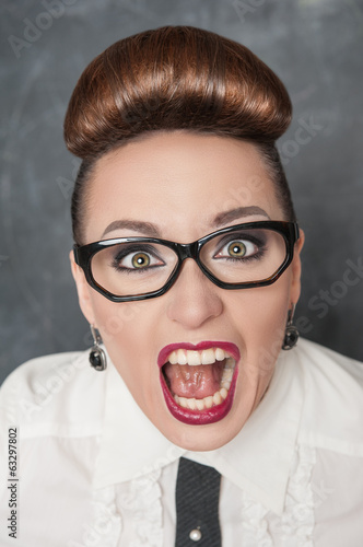 Photo: Angry screaming woman Angry screaming woman