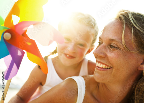Photo: Mother and Son Having Fun on the Beach Mother and Son Having Fun on the Beach
