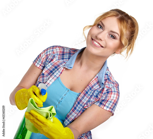 Photo: young housewife cleaning on white young housewife cleaning on white