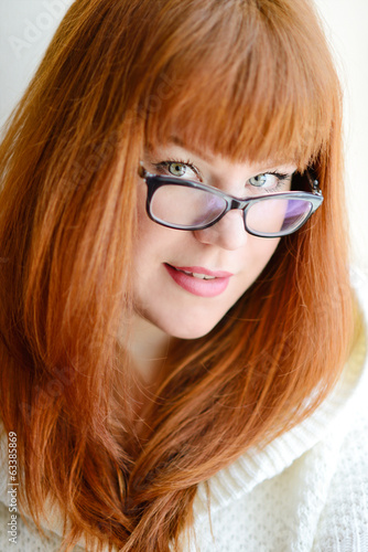 Photo: redhead girl with glasses redhead girl with glasses