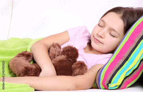 Photo: Beautiful little girl sleeping, close-up Beautiful little girl sleeping, close-up