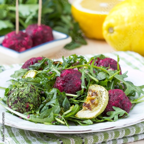 Photo: Fresh summer salad with arugula, zucchini, balls of beet Fresh summer salad with arugula, zucchini, balls of beet