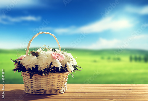 Photo: flowers on table and spring field flowers on table and spring field