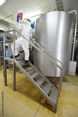 Photo: perfect formula - Technician with thumb up gesture perfect formula - Technician with thumb up gesture