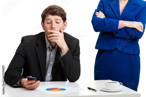 Photo: Worker during controlling by boss Worker during controlling by boss