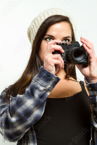 Photo: Female photographer frames a picture Female photographer frames a picture